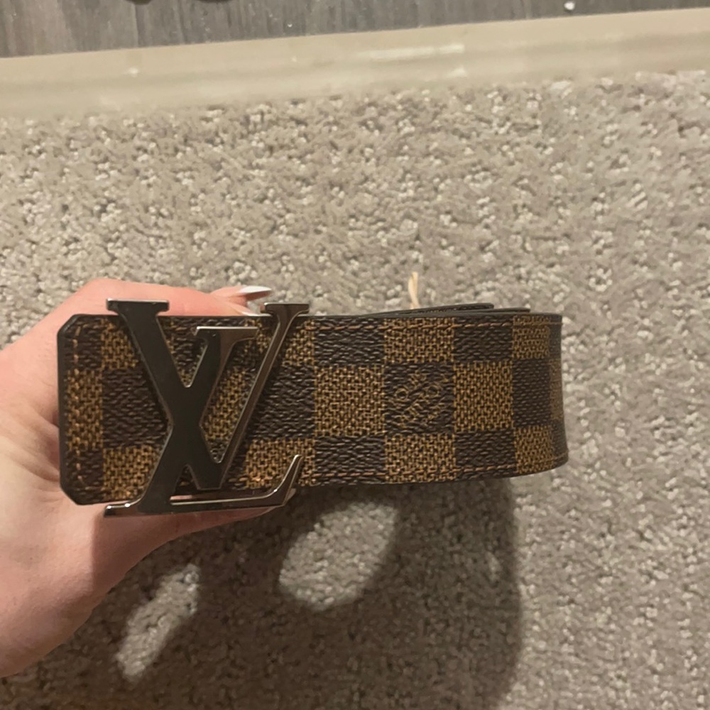 Like new man’s Louis Vuitton brown belts with gold buckle